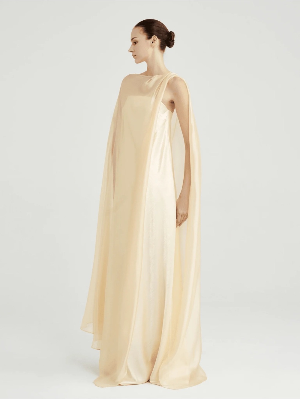 Sleek Cream Maxi Gown with Draped Cape